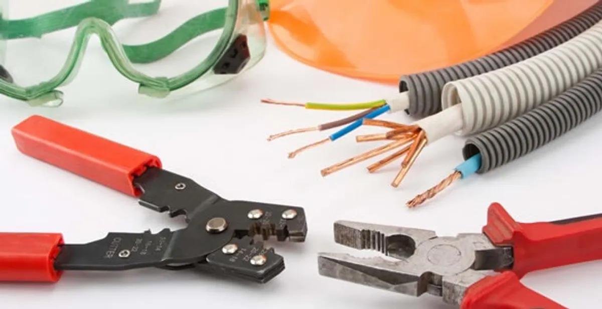 Electrical wiring repair with professional tools and safety equipment in Aurora, IL