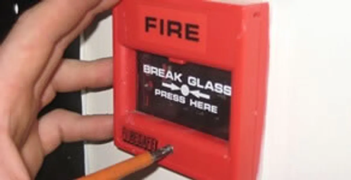 fire alarm installation service showing manual fire alarm pull station installed by licensed electricians in Naperville, IL