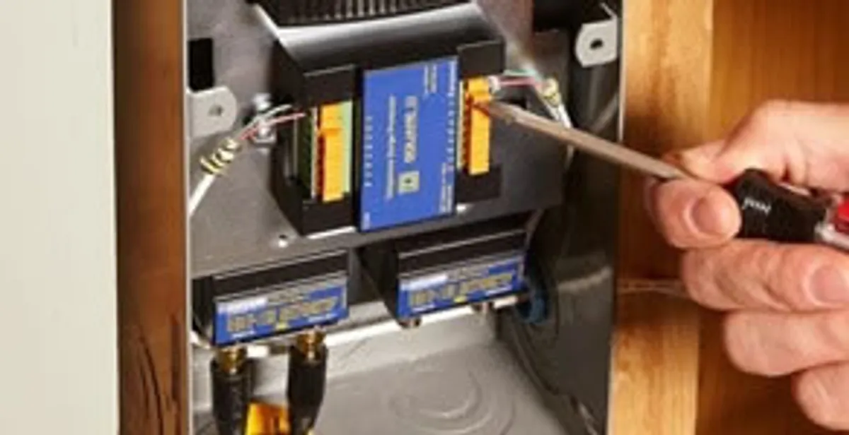 Whole home surge protection device being installed by a licensed electrician to protect electrical systems in Naperville, IL